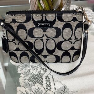 COACH Corner Zip Wristlet Black Logo and Stripe